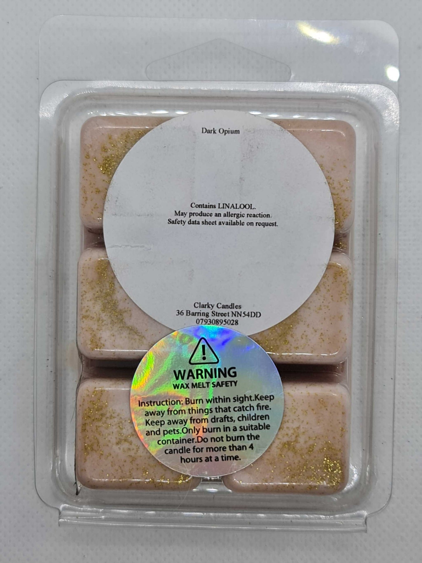 Dark Opium wax melt with warm oriental spicy fragrance in brown 6-segment plastic container