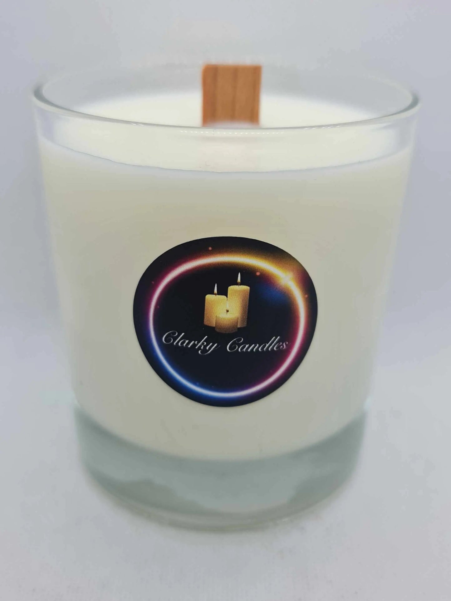Winter Fae wood wick scented soy wax candle in clear glass with sweet fruity fragrance