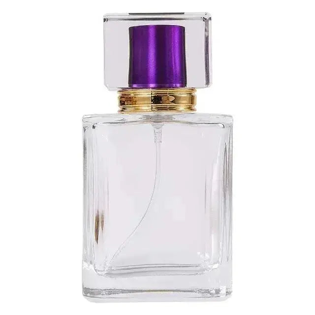 Enigmatic Bloom Perfume 50ml with purple cap in clear glass bottle for woody floral fragrance