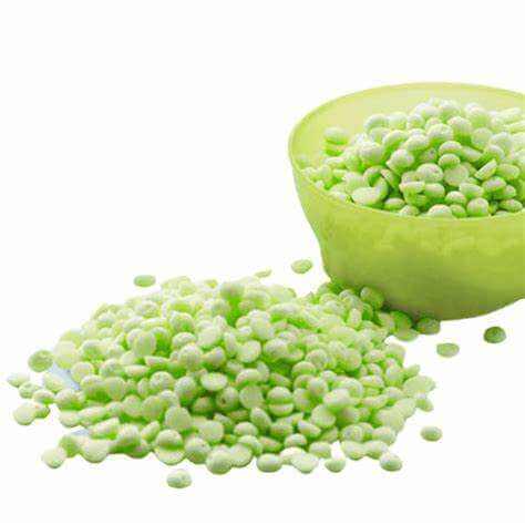 Sunkiss Unstoppable carpet freshener green beads in bowl and spilled on surface