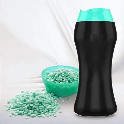 Uplift Unstoppable carpet freshener 500g black shaker with turquoise lid and freshening beads spilling out