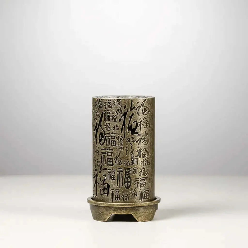 Decorative incense stick holder with ash-catching base