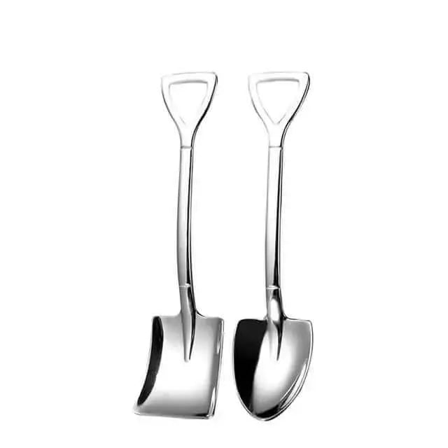 Spoons Collection by Clarky Candles featuring unique shovel-shaped silver spoons for home fragrance rituals.