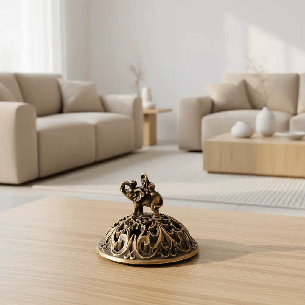 Elephant Vintage-Inspired Incense Burner on a wooden table in a stylish living room.