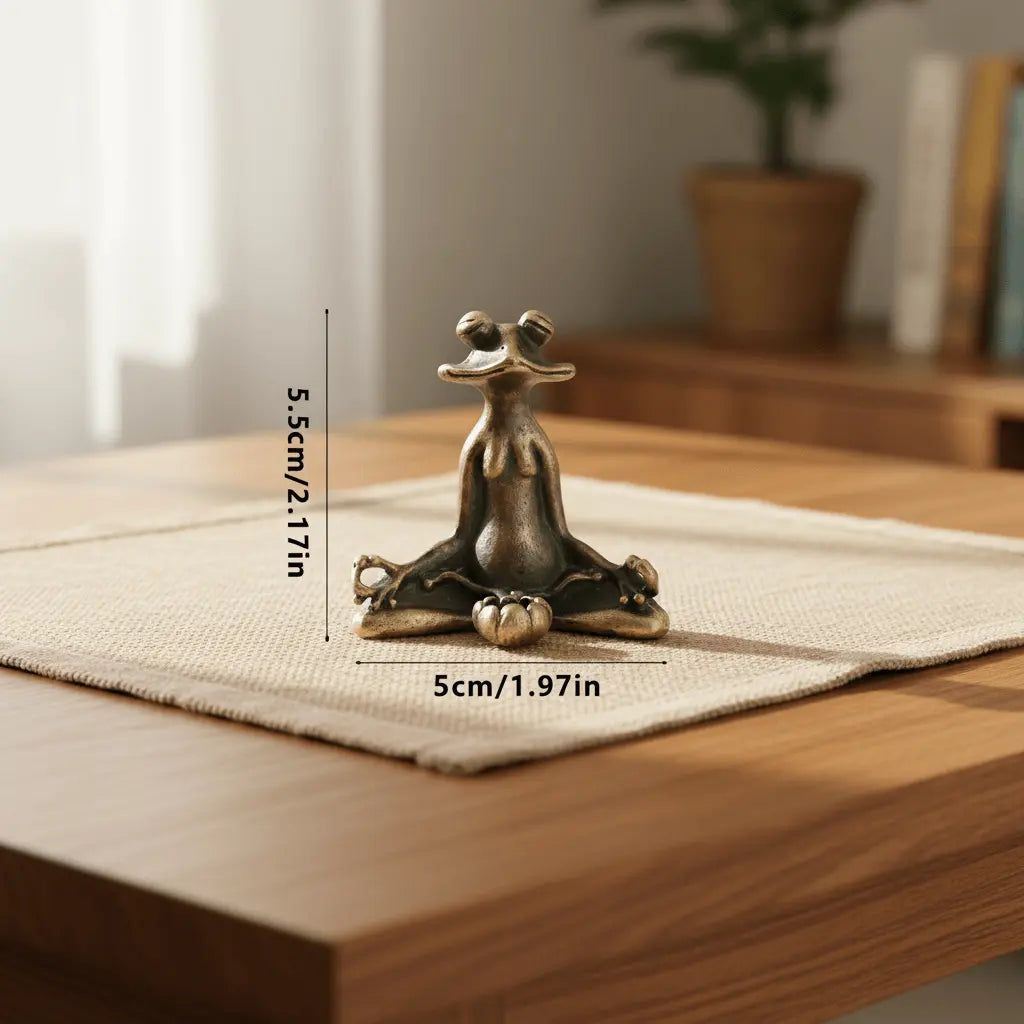 Frog on Lotus Leaf Incense Stick Holder featuring a meditating frog figure on a table.