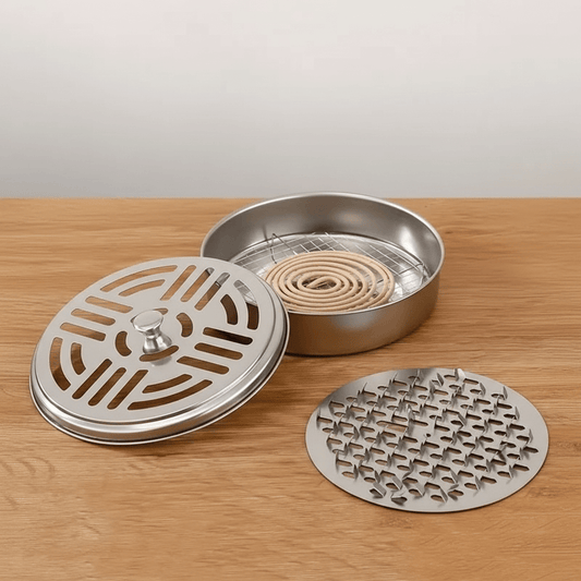 Stainless steel incense coil burner shown with removable mesh screen and ash catcher bowl