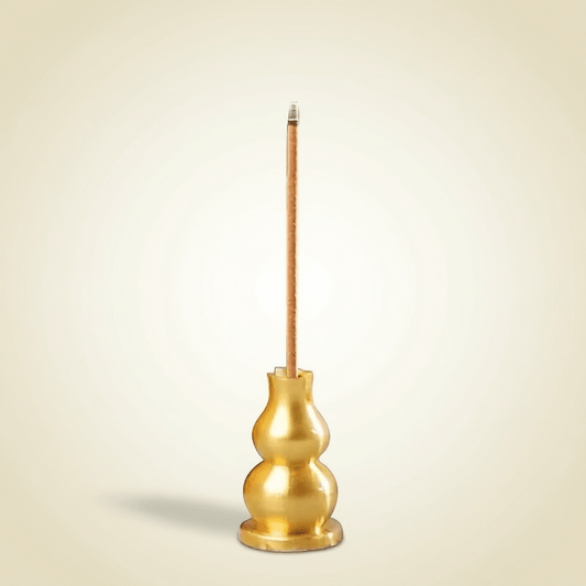 Incense Holder in small copper design with wooden handle for burning incense sticks safely and stylishly.