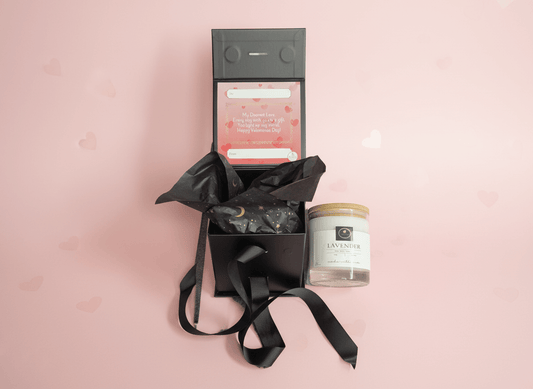 Lavender luxury scented candle gift box with personalized Valentine’s message and black ribbon.